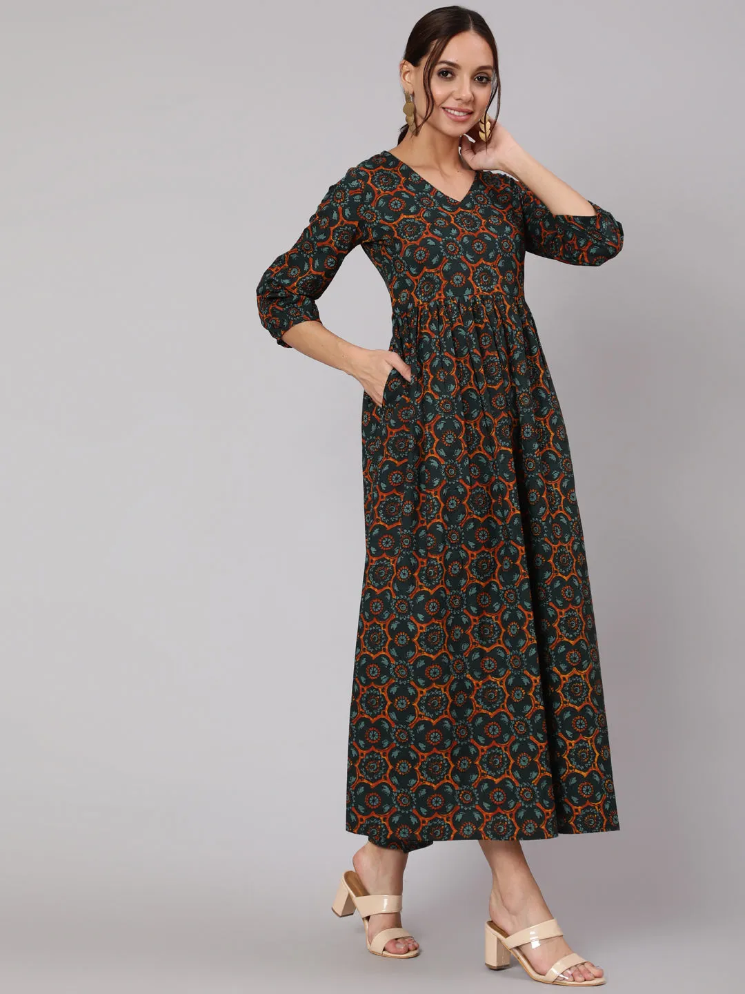 Women Green Abstrac Printed Gathered Dress With Three Quarter Sleeves